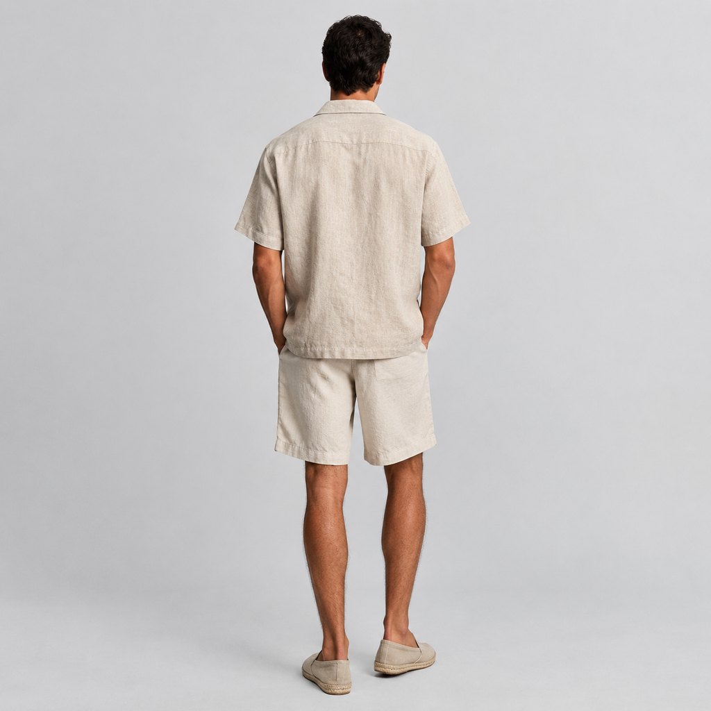 Beige linen camp collar shirt worn by a model, front view — view 4
