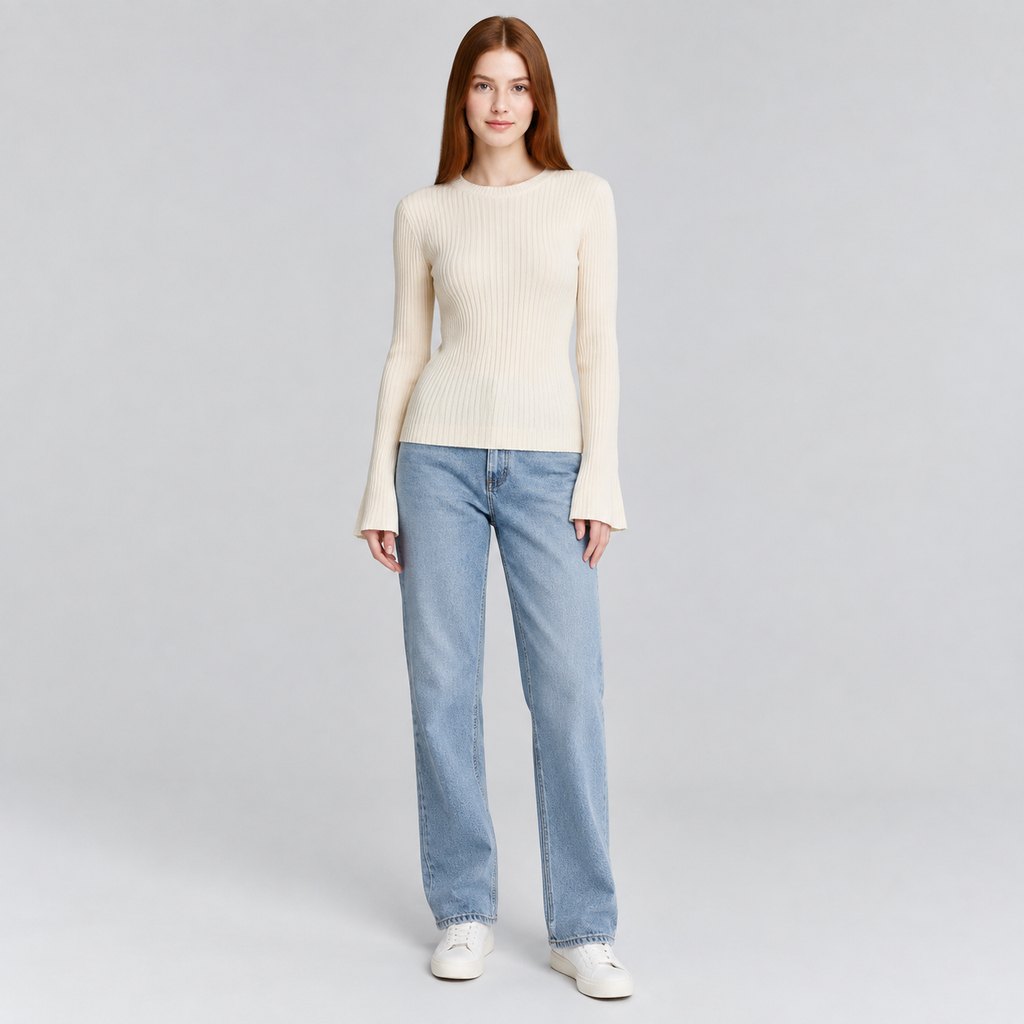 Cream ribbed knit sweater worn by a model, front view — view 2