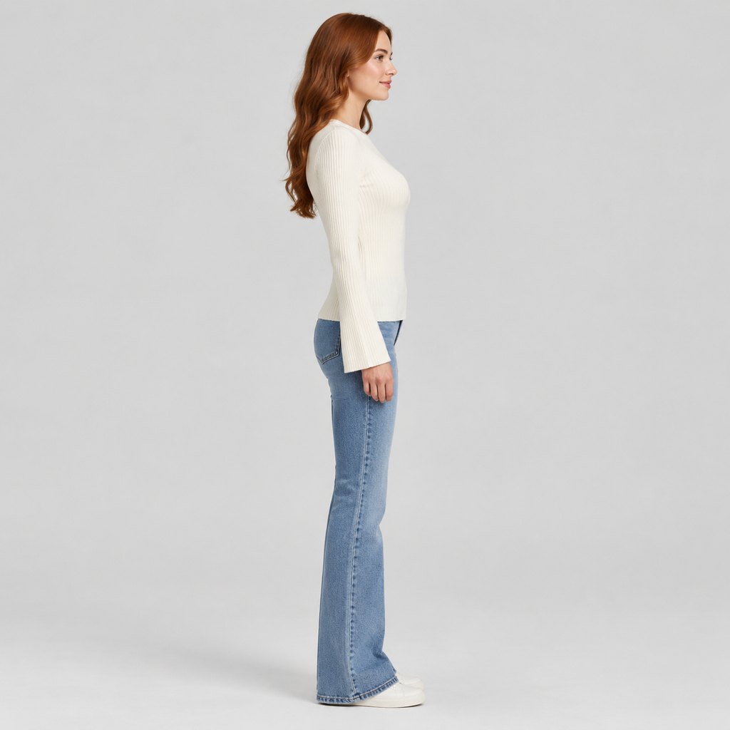 Cream ribbed knit sweater worn by a model, front view — view 3